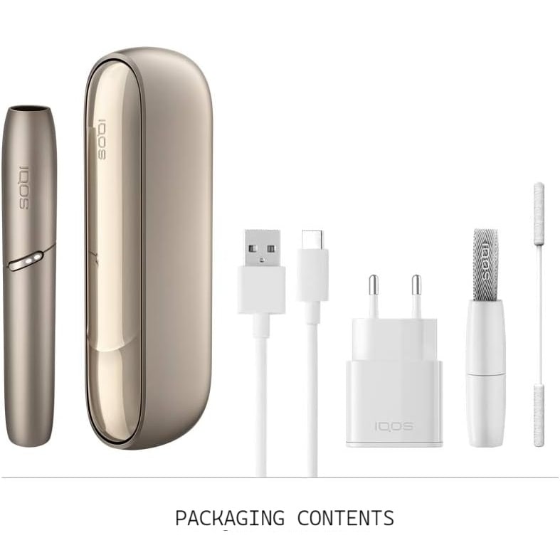 Iqos product packaging with electronic device, charger, and accessories on a white background