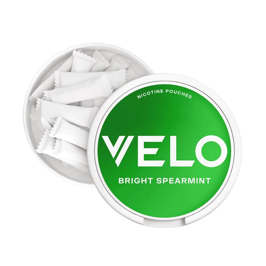 VELO bright spearmint nicotine pouches in a green container on a white background